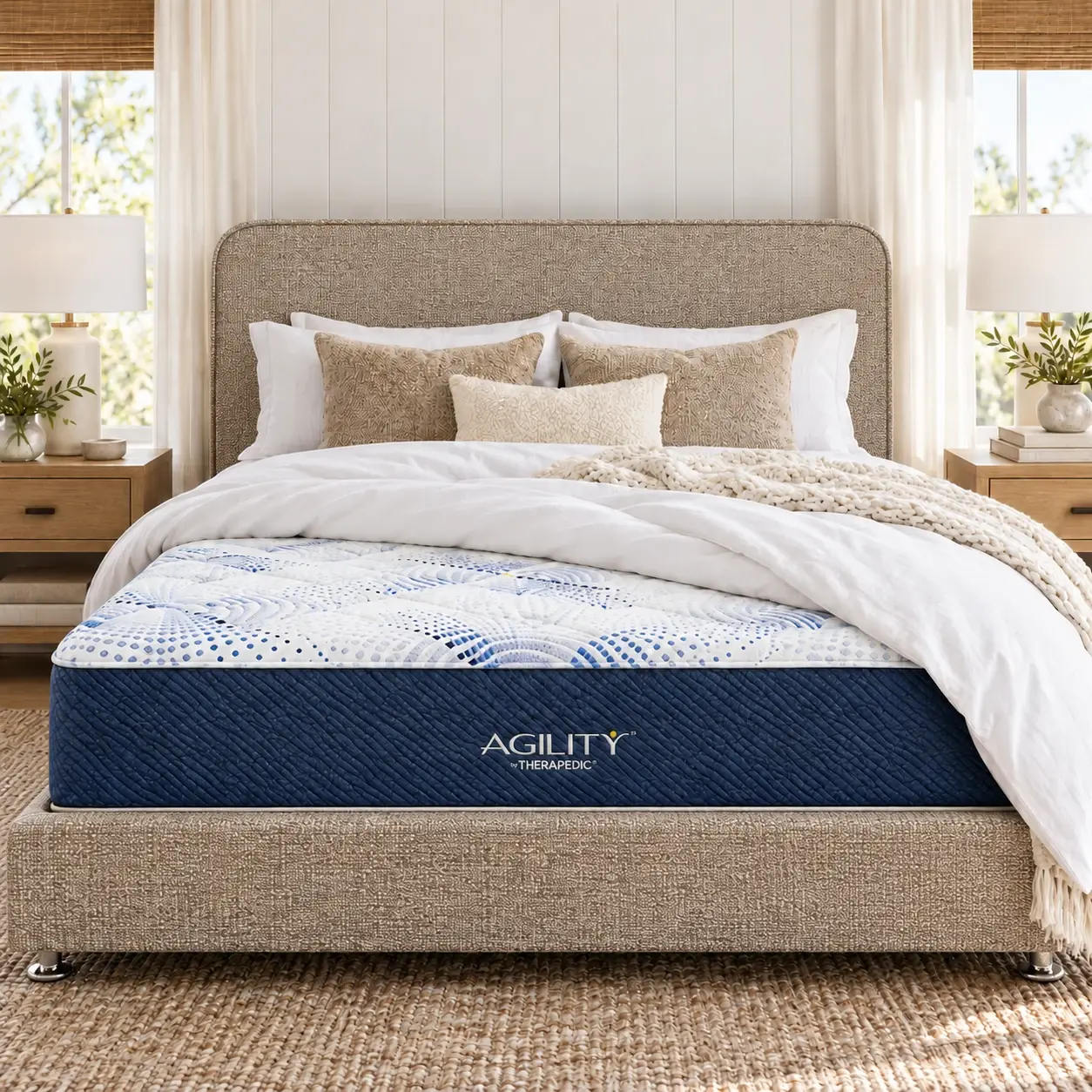 Therapedic Agility mattress with its range logo, styled with a biscuit upholstered bedhead and standard base